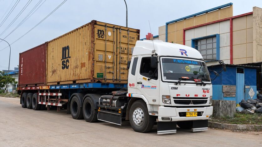 fuso truck and weathered containers